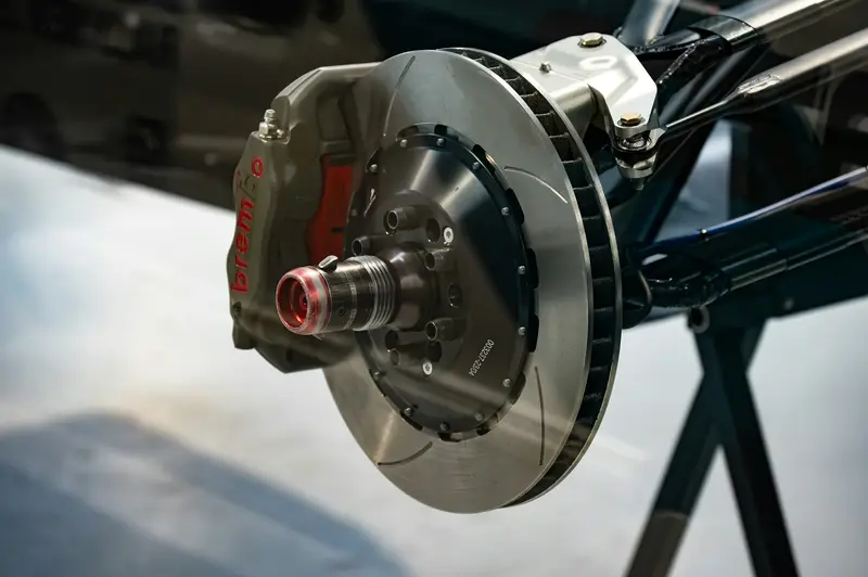 Performance brake disc and suspension on a sports car in Billingshurst