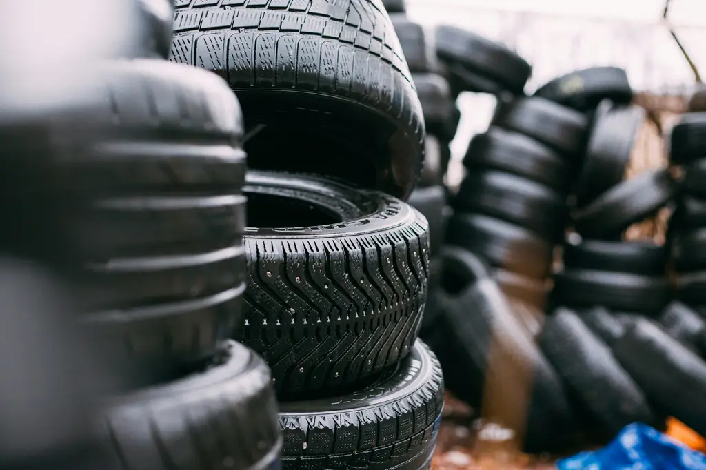 Stacks of new car tyres ready for fitting at Billingshurst MOT & Service Centre