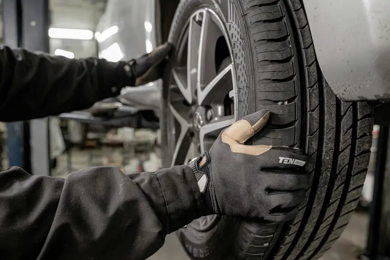 Technician fitting a new tyre at Billingshurst MOT & Service Centre